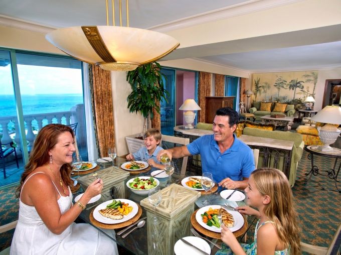 Couple and family enjoying diner